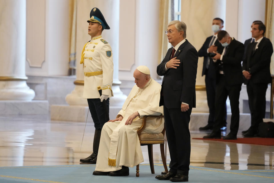 Pope Francis attends with Kazakhstan's President Kassym-Jomart Tokayev the welcome ceremony at the Presidential Palace Ak Orda, in Nur-Sultan, Kazakhstan, Tuesday, Sept. 13, 2022. Pope Francis begins a 3-days visit to the majority-Muslim former Soviet republic to minister to its tiny Catholic community and participate in a Kazakh-sponsored conference of world religious leaders. (AP Photo/Andrew Medichini)