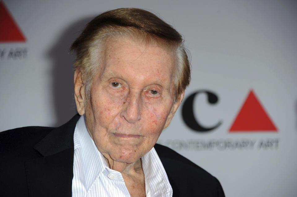 FILE - In this April 20, 2013, file photo, media mogul Sumner Redstone arrives at the 2013 MOCA Gala celebrating the opening of the Urs Fischer exhibition at MOCA, in Los Angeles. Redstone, the strong-willed media mogul whose public disputes with family members and subordinates made him a feared operator in Hollywood, died Wednesday, Aug. 12, 2020. (Photo by Richard Shotwell/Invision/AP, File)