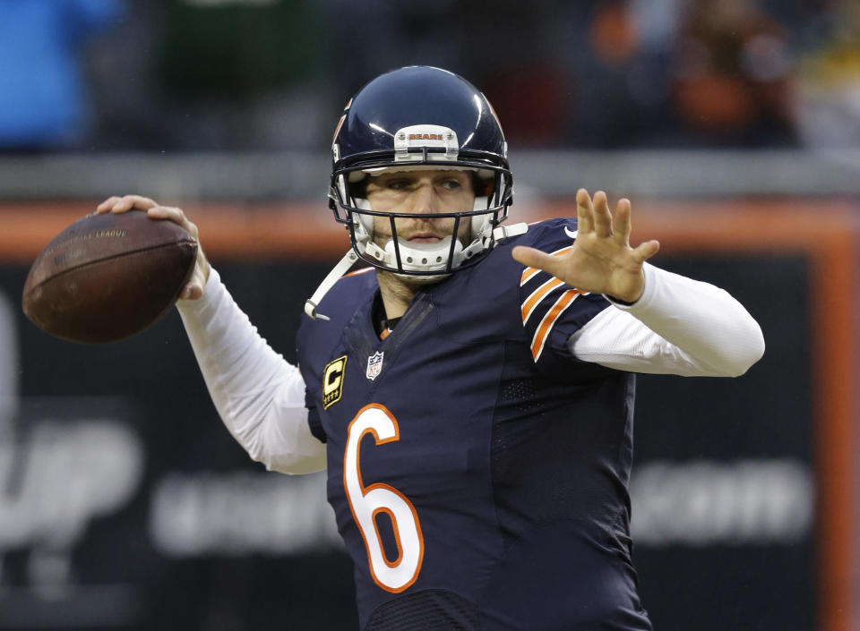 FILE - In this Dec. 29, 2013 file photo, Chicago Bears quarterback Jay Cutler warms up before an NFL football game against the Green Bay Packers in Chicago. On Thursday, Jan. 2, 2014, the Bears announced they have signed Cutler to a seven-year contract. It came after some speculation that the Bears might part with Cutler after five years. Terms were not disclosed. (AP Photo/Nam Y. Huh, FIle)