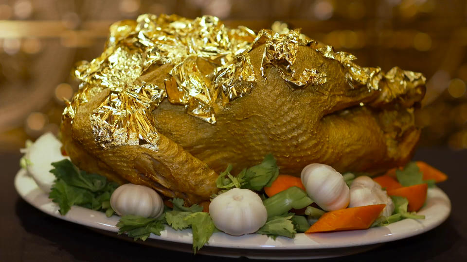 The Old Homestead $181,000 Thanksgiving dinner boasts two gold-painted and gold-dusted free-range turkeys that costs $145 per pound topped with gold flakes.