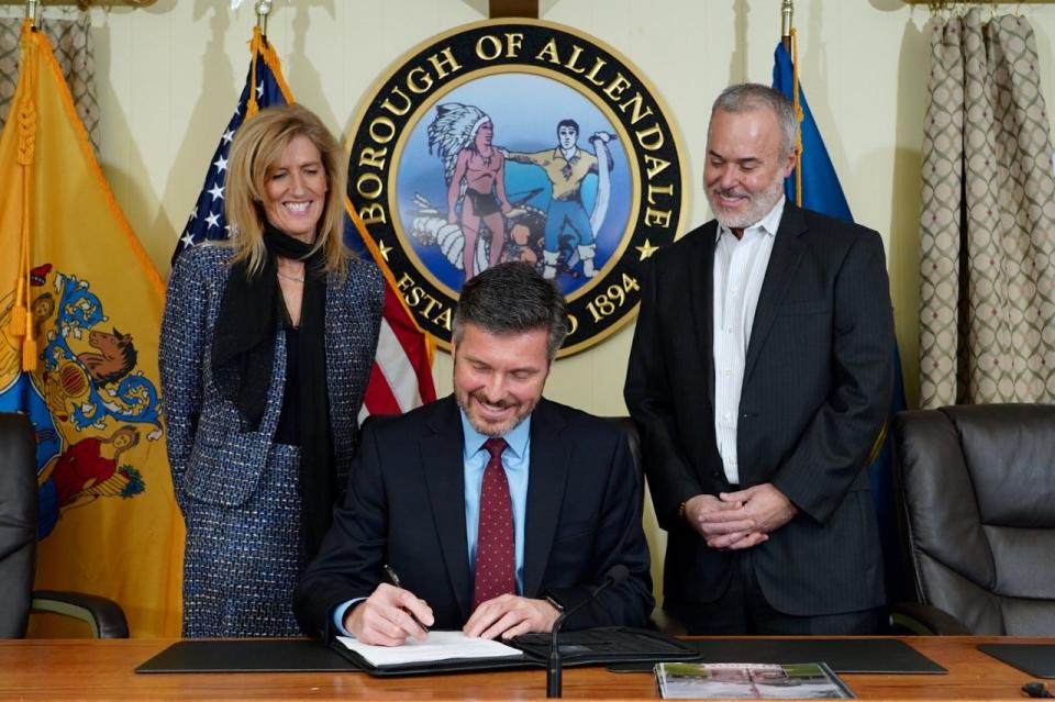 Allendale Councilwoman Liz Homan, Vice President and General Manager NJ Division Alan Weland, and Allendale Mayor Ari Bernstein at signing of water supply contract.