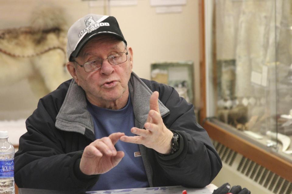 FILE - In this March 14, 2014, file photo, Howard Farley, who helped organize Nome as the end of the Iditarod Trail Sled Dog Race ahead of the first running in 1973, is seen at the Carrie M. McLain Memorial Museum in Nome, Alaska. The world's most famous sled dog race starts Sunday, March 7, 2021, without its defending champion in a contest that will be as much dominated by unknowns and changes because of the pandemic as mushers are by the Alaska terrain. (AP Photo/Mark Thiessen, File)