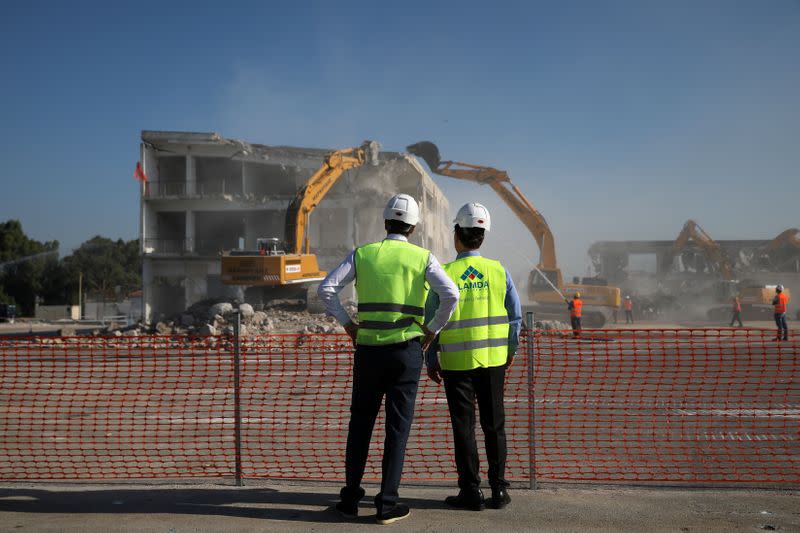 Greek Prime Minister Kyriakos Mitsotakis and Lamda Development CEO Odisseas Athanasiou attend an inaugural ceremony of works at the disused Hellenikon airport in Athens