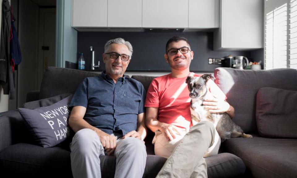 Mike Goldberg, his partner Heyder Magalhaes and their dog, Effy, who are relocating from north London.