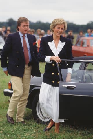 <p> Princess Diana Archive/Getty</p> Princess Diana and Ken Wharfe at Windsor Great Park in July 1988.