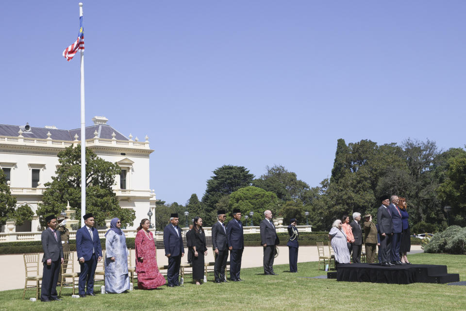 The Prime Minister of Malaysia Anwar Ibrahim, third right, stands with Australian Prime Minister Anthony Albanese and the Governor of Victoria, Margaret Gardner, right, and the official party during a ceremonial welcome at Government House ahead of the ASEAN-Australia Special Summit in Melbourne, Australia, Monday, March 4, 2024. An increasingly assertive China and a humanitarian crisis in Myanmar are likely to be high on the agenda when Southeast Asian leaders meet in Australia for a rare summit March 4-6. (AP Photo/Hamish Blair)