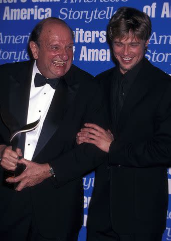 <p>Ron Galella, Ltd./Ron Galella Collection via Getty</p> Bo Goldman and Brad Pitt attend the 50th Annual Writers Guild of America Awards on Feb. 21, 1998, in Beverly Hills, California