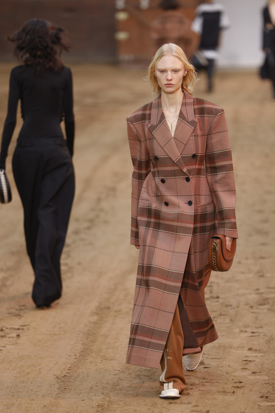 A model wears a creation as part of the Stella McCartney Fall/Winter 2023-2024 ready-to-wear collection presented Monday, March 6, 2023 in Paris. (Vianney Le Caer/Invision/AP)
