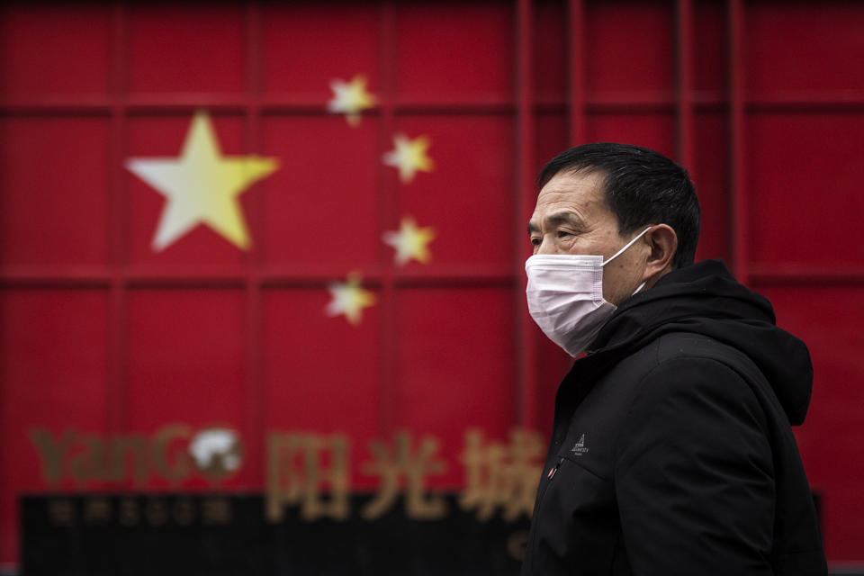 WUHAN, CHINA - FEBRUARY 10: A man wears a protective mask on February 10, 2020 in Wuhan, China. Flights, trains and public transport including buses, subway and ferry services have been closed for the nineteenth day. The number of those who have died from the Wuhan coronavirus, known as 2019-nCoV, in China climbed to 909.  (Photo by Stringer/Getty Images)