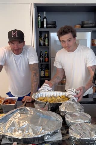 <p>Nicola Peltz/TikTok</p> David and Brooklyn Beckham show off a Christmas dish