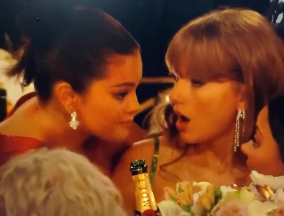 Selena Gomez was caught gossiping with Taylor Swift at the Golden Globes (Golden Globes / Dick Clark Productions)