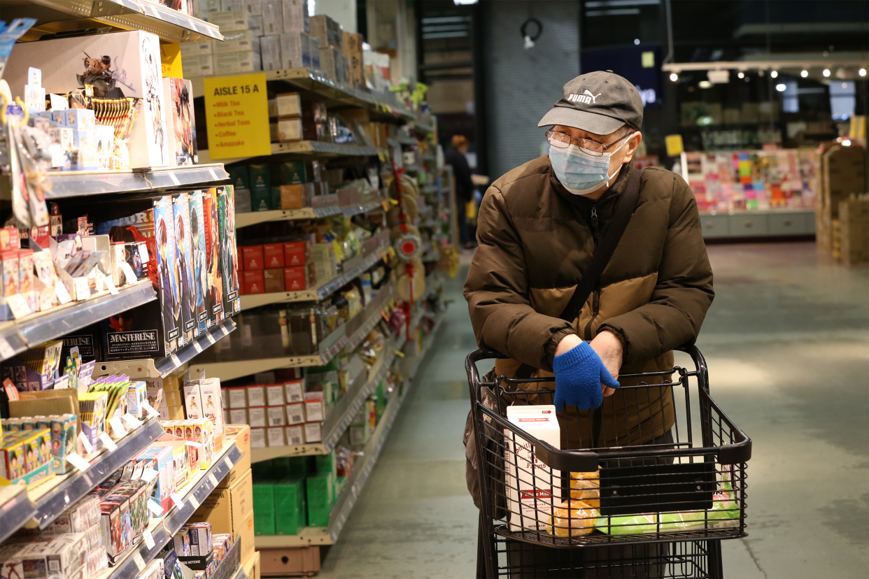 man shopping in grocery store