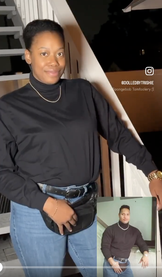 woman in a turtleneck, jeans, and gold chain