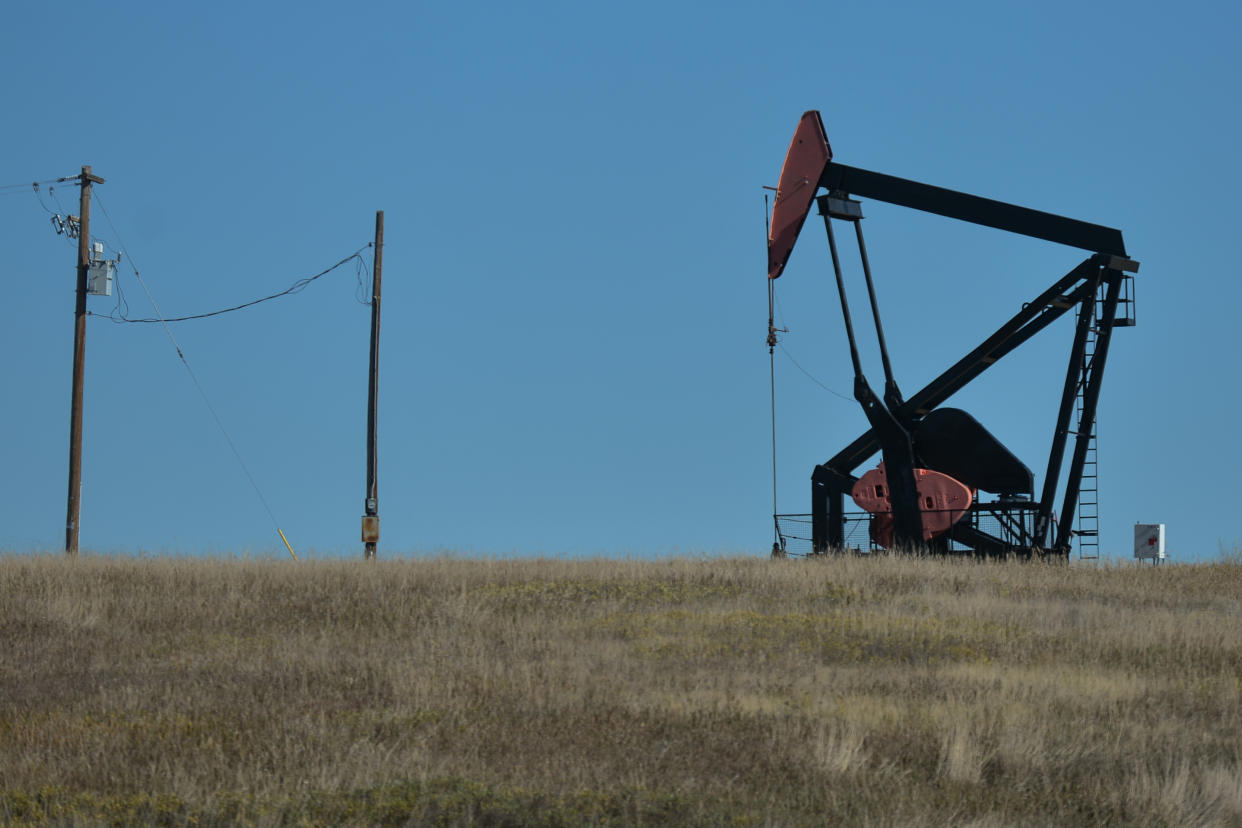 An oil well in a field near Drumheller.
On Tuesday, 28 September 2021, in Drumheller, Alberta, Canada. (Photo by Artur Widak/NurPhoto via Getty Images)