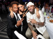<p>Gary Dourdan, Eva Longoria and Nicky Jam pause for a picture at the Global Gift Gala during the 75th annual Cannes Film Festival at the JW Marriott in France on May 19. </p>