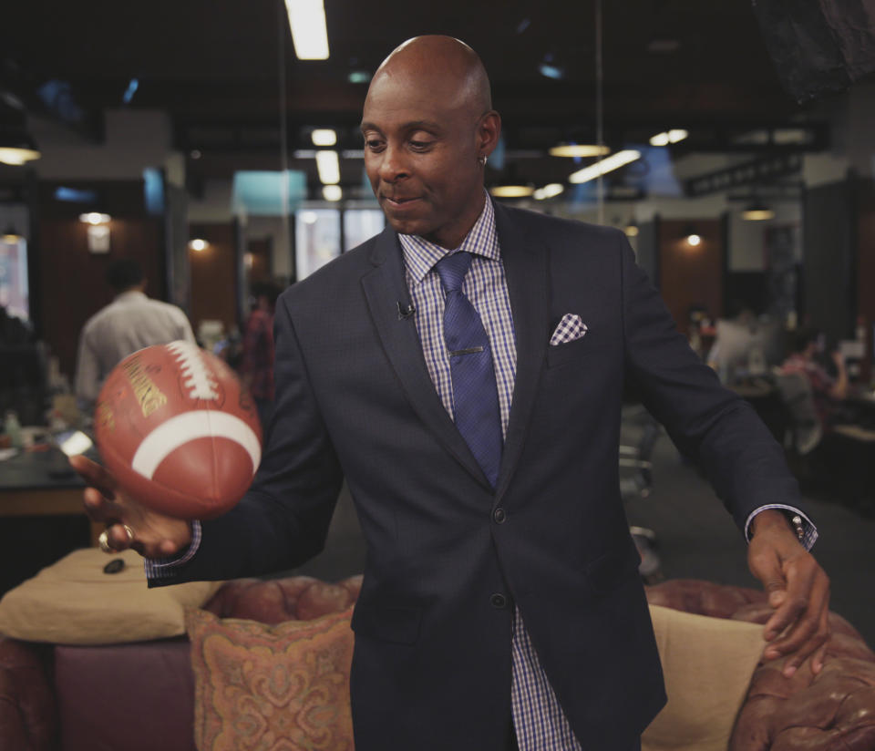 <p>The NFL legend catches a pass with ease in the HuffPost Live studio on Aug. 27, 2015.</p>