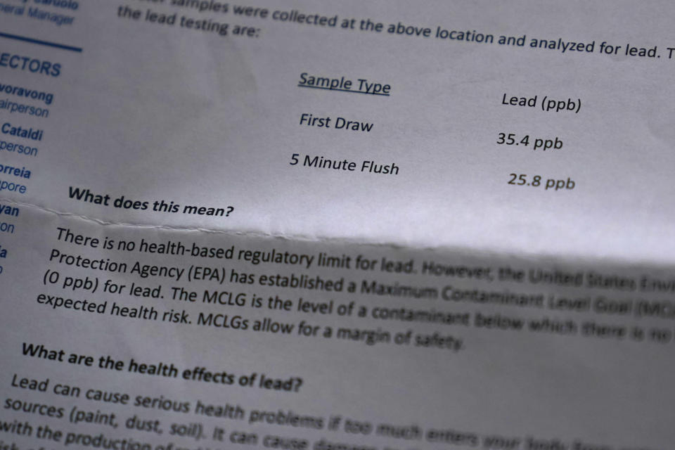 High lead levels from a residential water test are shown from a testing report of City of Providence water drawn from the pipes in Colleen Colarusso's home, Thursday, March 23, 2023, in Providence, R.I. Testing showed lead levels in her water at more than twice the federal limit. Before that, she drank and cooked with tap water. (AP Photo/Charles Krupa)