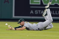 Oakland Athletics right fielder Stephen Piscotty dives but cannot make the catch on a pop fly from Los Angeles Angels' Phil Gosselin during the fourth inning of a baseball game Tuesday, Aug. 2, 2022, in Anaheim, Calif. Gosselin drove in a run on the play and was thrown out at second base.(AP Photo/Marcio Jose Sanchez)
