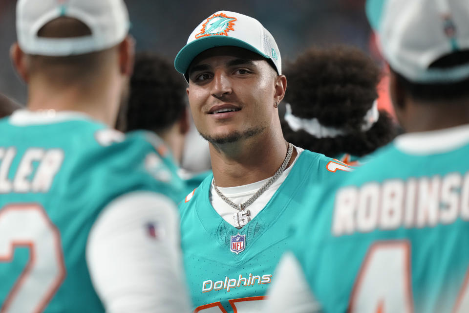 Miami Dolphins linebacker Jaelan Phillips watches the game from the sidelines during the first half of a pre season NFL football game against the Atlanta Falcons, Friday, Aug. 9, 2024, in Miami Gardens, Fla. (AP Photo/Wilfredo Lee)