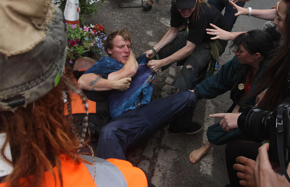 Protesters clash with police at the Balcombe fracking site in West Sussex as energy company Cuadrilla has started testing equipment ahead of exploratory oil drilling in the English countryside as anti-fracking protests at the site entered a ninth day.