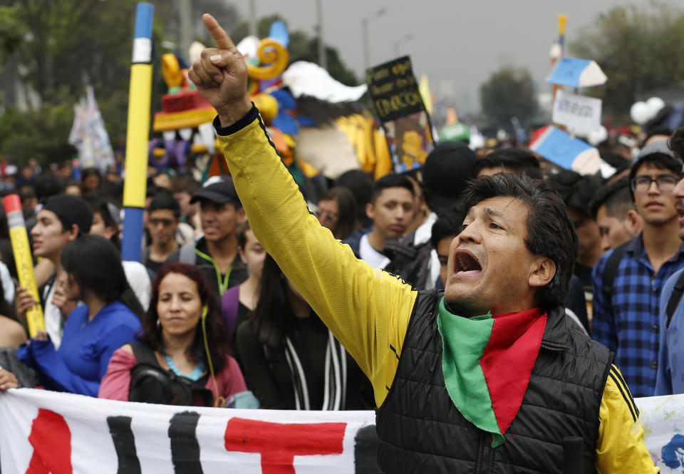 A man yells during a protest asking for a hike in the budget for public higher education, in Bogota, Colombia, Thursday, Nov. 15, 2018. The so-called “Pencil March” is the latest in more than a half-dozen street protests in recent months demanding the government step up funding for education. (AP Photo/Fernando Vergara)