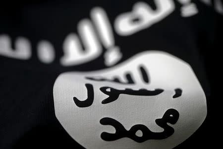 An Islamic State flag is seen in this picture illustration taken February 18, 2016. REUTERS/Dado Ruvic/Illustration/Files