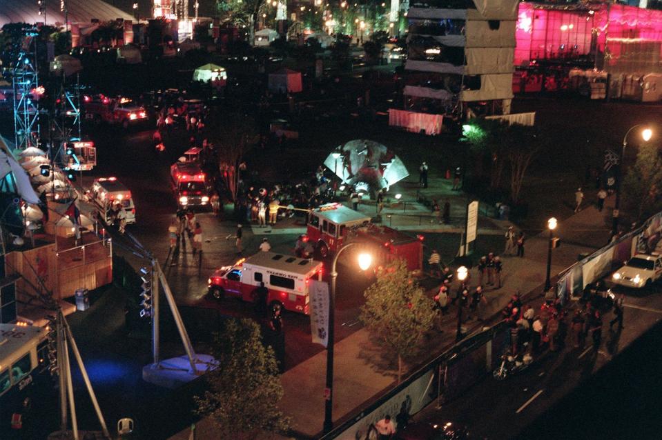 FILE - This Saturday morning, July 27, 1996, file photo shows an overview of Centennial Park in Atlanta after an explosion struck a tower near a stage where thousands of people were watching a concert(AP Photo/Clive Brooks, File)