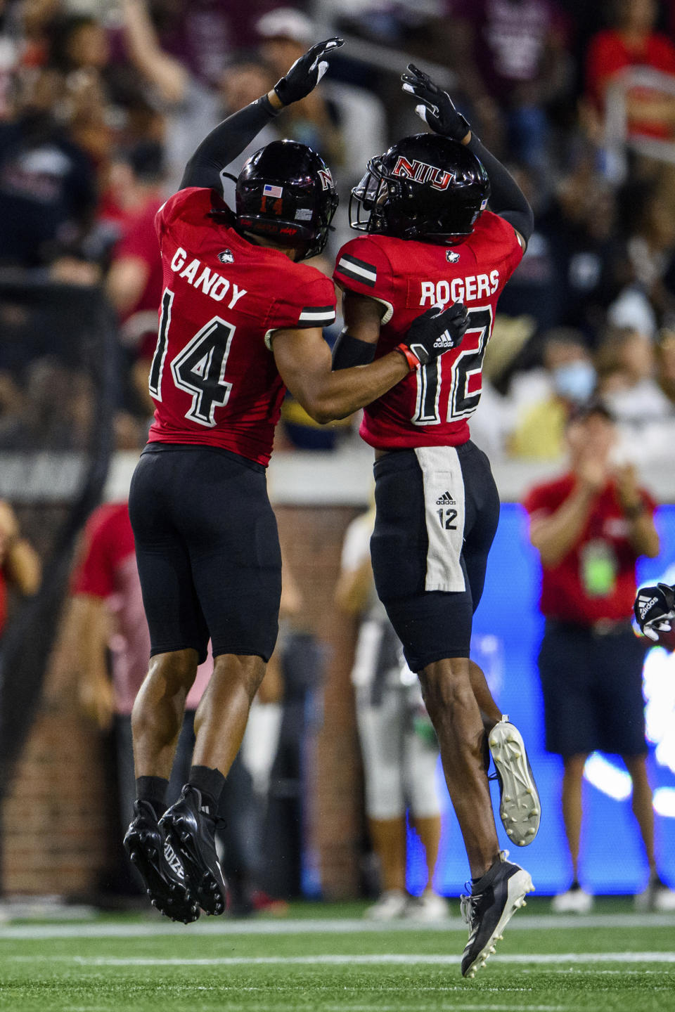 Northern Illinois cornerbacks Eric Rogers (12) and Jordan Gandy (14) celebrate during the first half of an NCAA college football game against Georgia Tech, Saturday, Sept. 4, 2021, in Atlanta. (AP Photo/Danny Karnik)