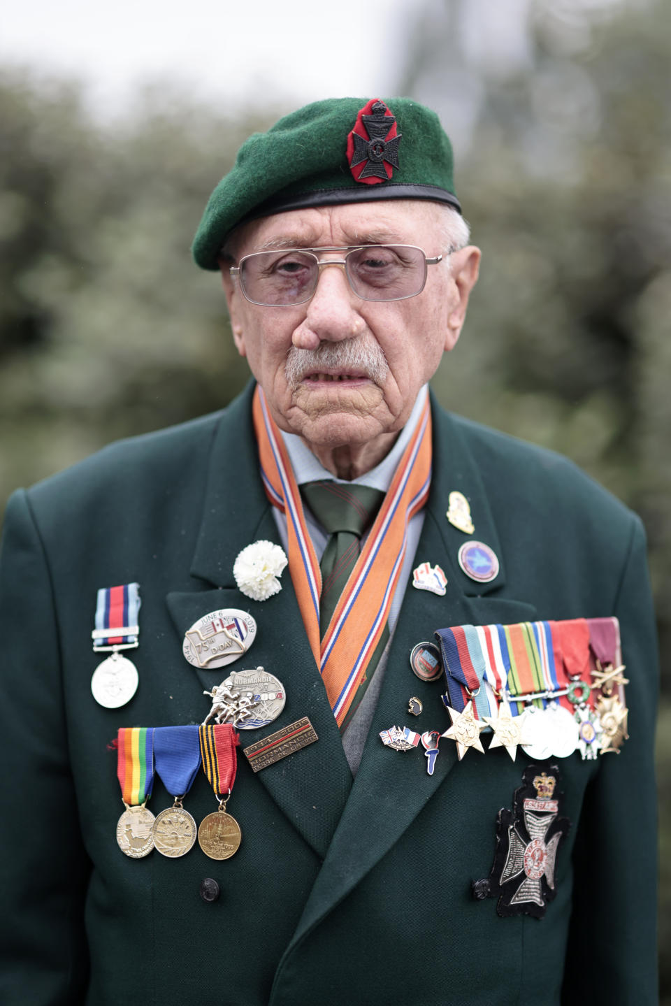 British veteran Richard Forrester of the Kings Royal Rifle Corps arrives at the ceremony at Pegasus Bridge, in Ranville, Normandy, Sunday, June, 5, 2022. On Monday, the Normandy American Cemetery and Memorial, home to the gravesites of 9,386 who died fighting on D-Day and in the operations that followed, will host U.S. veterans and thousands of visitors in its first major public ceremony since 2019. (AP Photo/Jeremias Gonzalez)