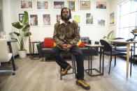 Community organizer Chase Madkins poses for a portrait in a Black-owned coffee shop in Memphis, Tenn., on Monday, Jan. 30, 2023. Madkins says Black men like he and Tyre Nichols are often pulled over by police own flimsy pretexts hopes of finding some more serious violation. (AP Photo/Allen G. Breed)