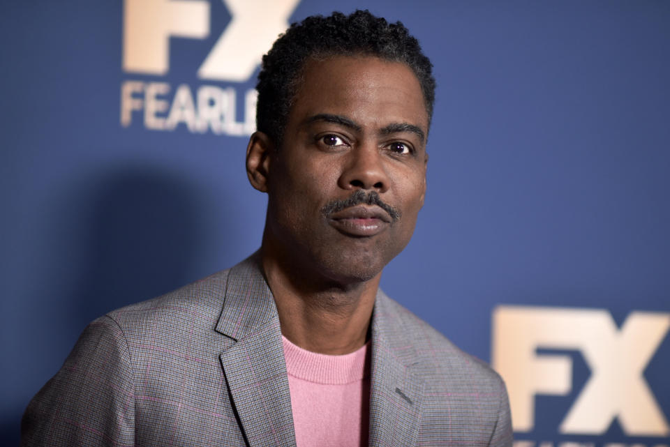 FILE - Chris Rock appears at the Television Critics Association Winter press tour in Pasadena, Calif., on Jan. 9, 2020. Rock will be the first artist to perform on Netflix's first-ever live, global streaming event. (Photo by Richard Shotwell/Invision/AP, File)