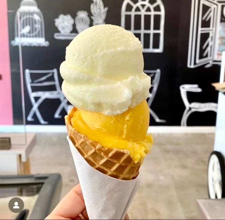 Can't decide between flavors at Rosa Ice Cream in Jupiter? Just go with two like this double stack of key lime and mango.