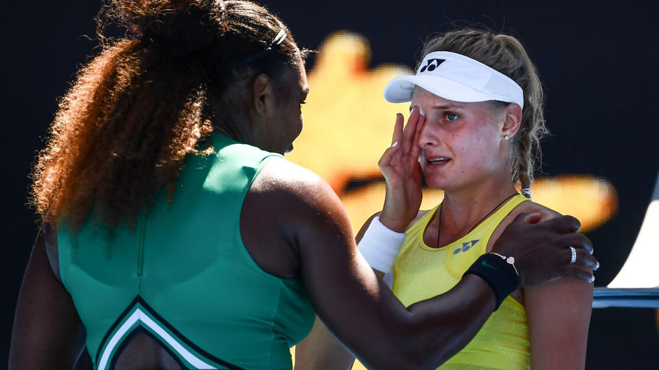 Serena Williams consoles Dayana Yastremska. (Photo by JEWEL SAMAD/AFP/Getty Images)