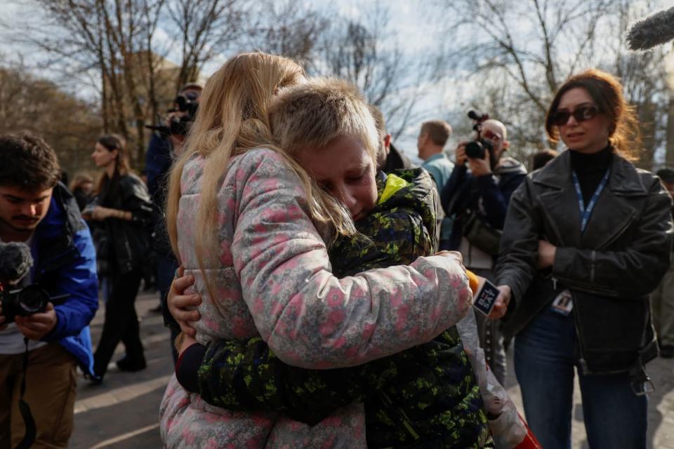 <div class="inline-image__title">UKRAINE-CRISIS/CHILDREN-RETURN</div> <div class="inline-image__caption"><p>A mother embraces her 13-year-old son, who went to a Russian-organized summer camp from non-government controlled territories and was then taken to Russia, after he returned via the Ukraine-Belarus border.</p></div> <div class="inline-image__credit">Valentyn Ogirenko/Reuters</div>