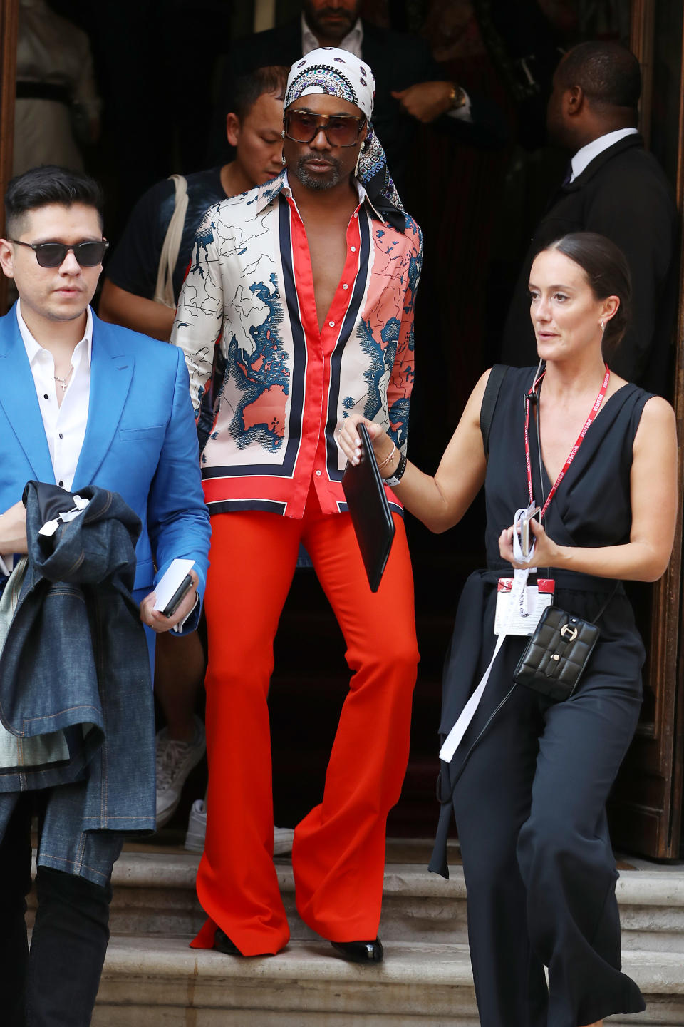 Billy Porter arrived wearing a pair of statement red trousers and a patterned shirt [Photo: Getty]