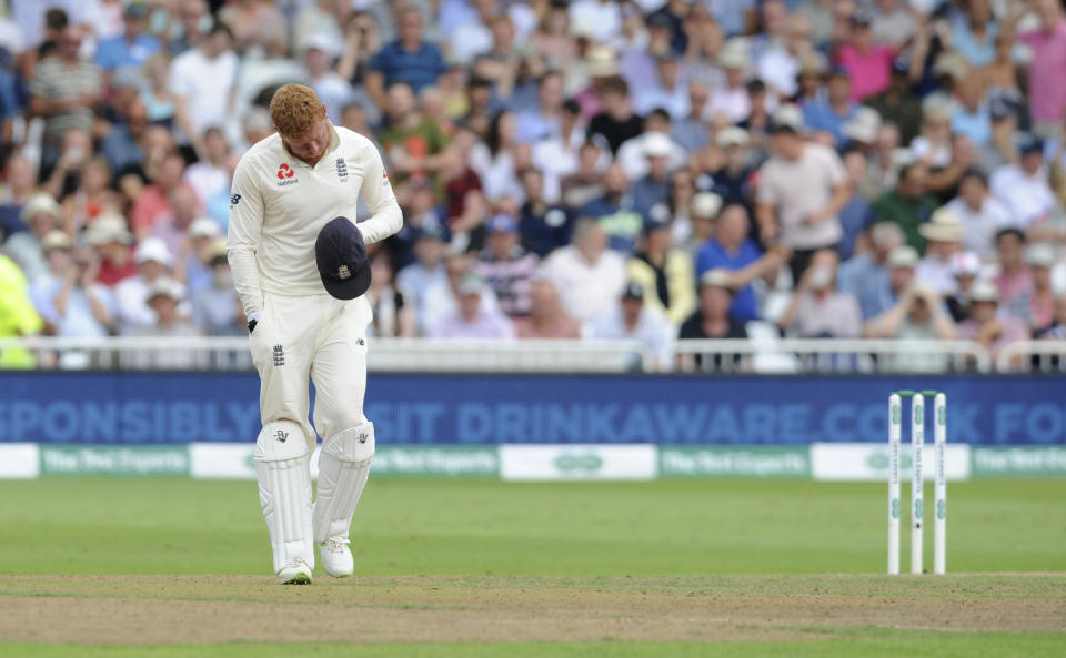 England's Jonny Bairstow leaves the field after injuring his finger while collecting the ball during the third day of the third cricket test match between England and India at Trent Bridge in Nottingham, England, Monday, Aug. 20, 2018. (AP Photo/Rui Vieira)