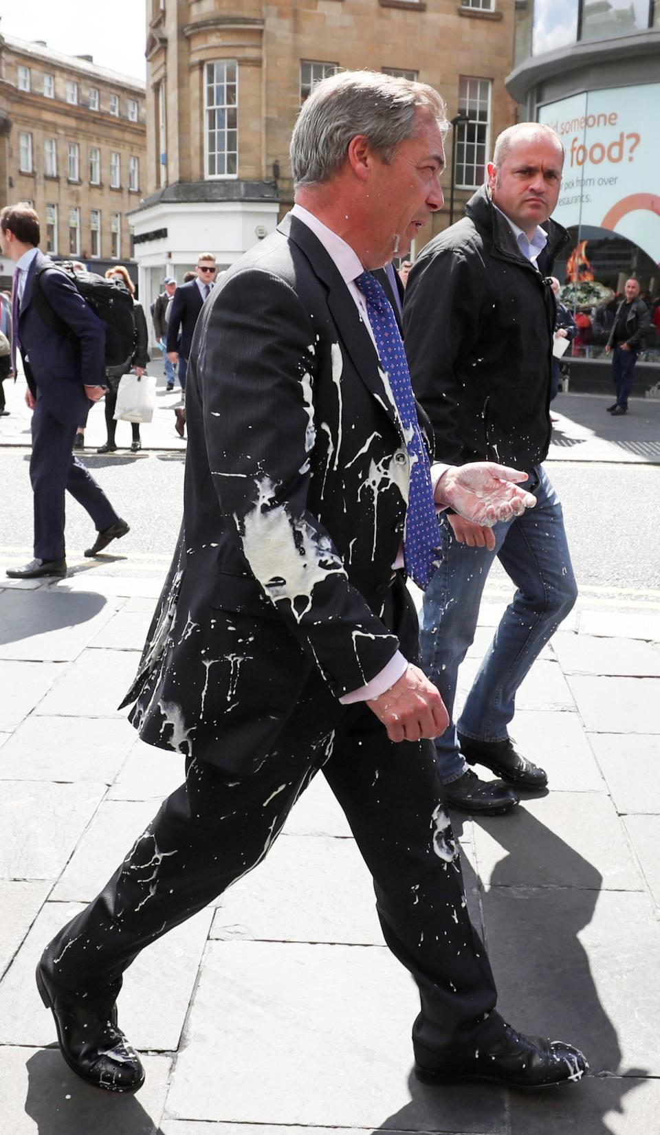 Nigel Farage milkshake attack: Man charged with common assault and criminal damage after drink is thrown at Brexit Party leader