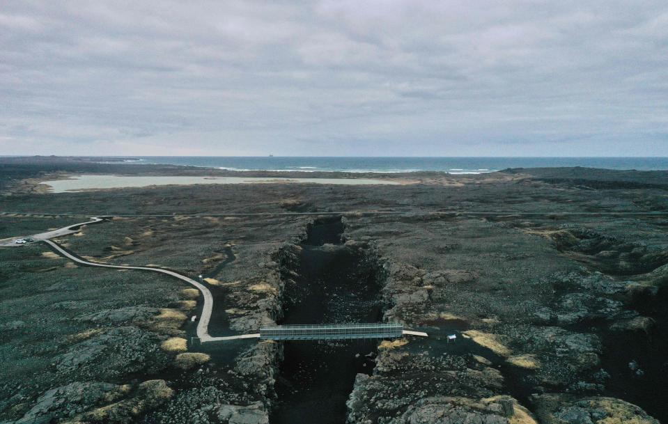 <p>Aerial view of the Reykjanes peninsula, Iceland, some 50 kilometres west of the capital Reykjavik – one of the three most seismically active areas on the planet</p> (AFP via Getty Images)