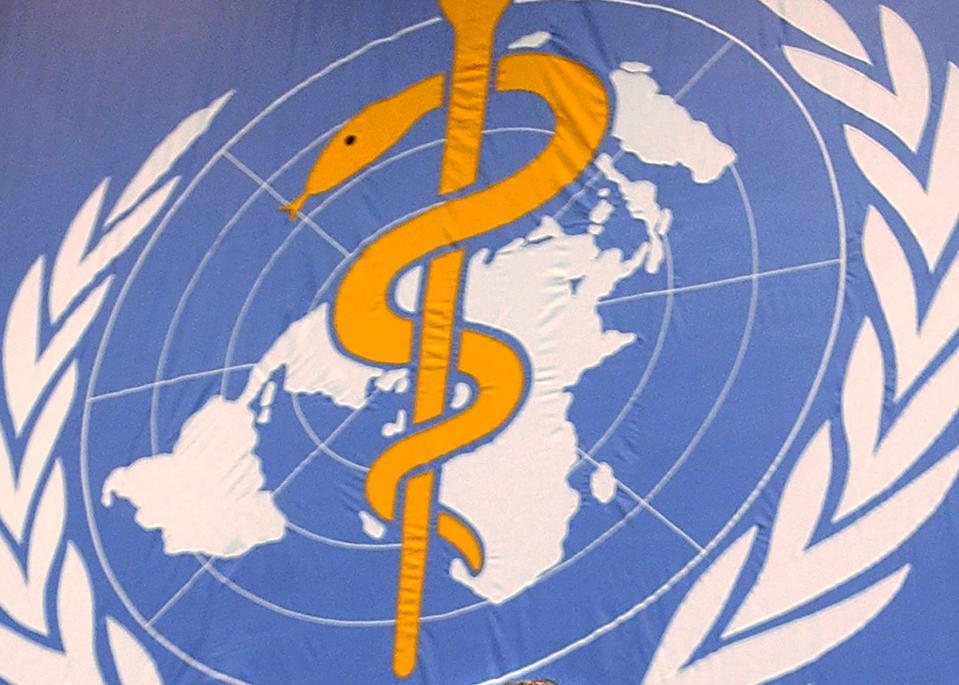 FILE - In this file photo dated Monday, May 17, 2004, The World Health Organisation, WHO, logo seen at the United Nations in Geneva, Switzerland. The World Health Organization’s European director Dr. Hans Kluge on Thursday Sept. 17, 2020, has warned countries against reducing the quarantine period for people potentially exposed to the coronavirus and acknowledged that COVID-19 “fatigue” is setting in. (Laurent Gillieron/Keystone FILE via AP)