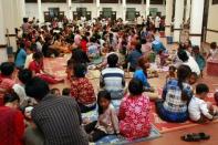 Children and their parents at Kantha Bopha children's hospital in Phnom Penh. Paediatrician Beat Richner, the founder of Kantha Bopha children's hospitals, which see around 85 percent of Cambodia's severely ill youngsters who make it to treatment, was the first to raise the alert over the mystery illness