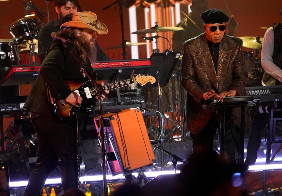 Chris Stapleton, left, and Stevie Wonder perform "Higher Ground" during a tribute to Motown at the 65th annual Grammy Awards on Sunday, Feb. 5, 2023, in Los Angeles. (AP Photo/Chris Pizzello)