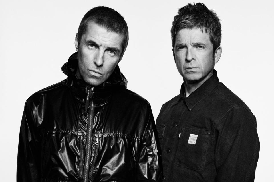 Liam and Noel Gallagher in a new photo accompanying their reunion announcement (EPA)