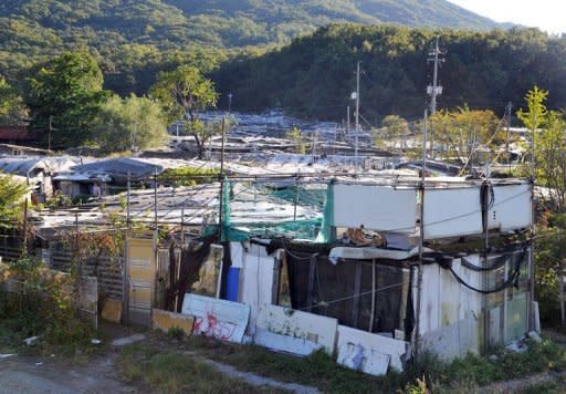 A cluster of shacks is seen in Guryong, a shanty town near South Korea's wealthiest Gangnam district in Seoul. The Guryong slum is a far cry from the glitzy world of neighbouring Gangnam, made famous by rapper Psy's global hit, "Gangnam Style"