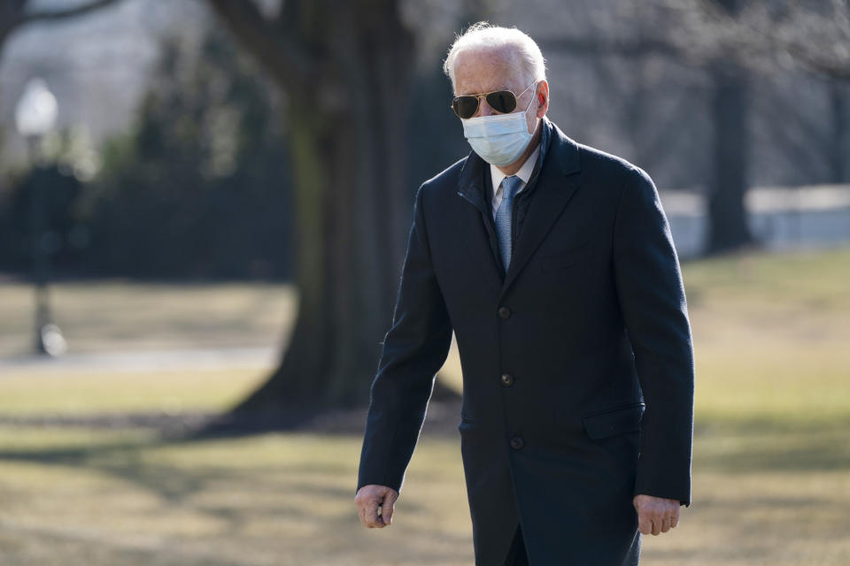 President Joe Biden arrives on the South Lawn of the White House on Feb. 8, 2021, in Washington. (Evan Vucci/AP)   