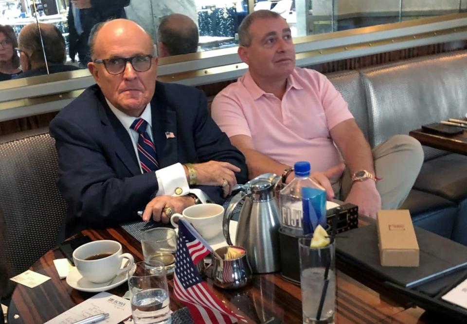 <div class="inline-image__caption"><p>Rudy Giuliani and Lev Parnas at the Trump International Hotel in Washington in September. </p></div> <div class="inline-image__credit">Aram Roston/Reuters</div>