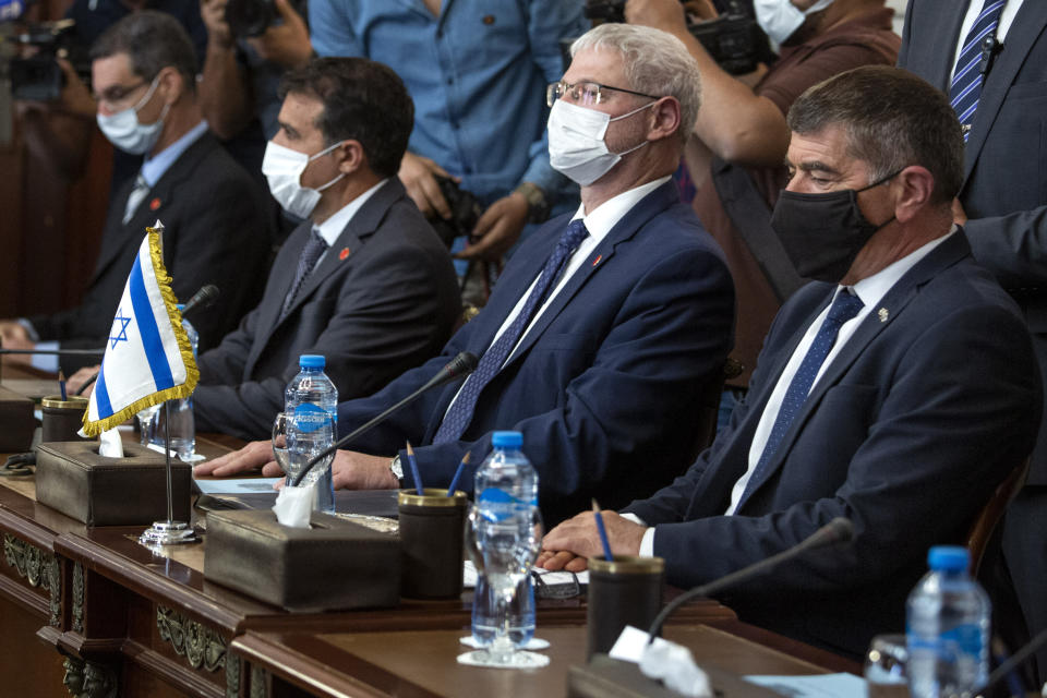 Israeli Foreign Minister Gabi Ashkenazi, right, meets with Egyptian Foreign Minister Sameh Shoukry (not shown), during high-level talks to shore up a fragile truce between Israel and the Hamas militant group at the Tahrir Palace in Cairo, Egypt, Sunday, May 30, 2021. (AP Photo/Nariman El-Mofty)