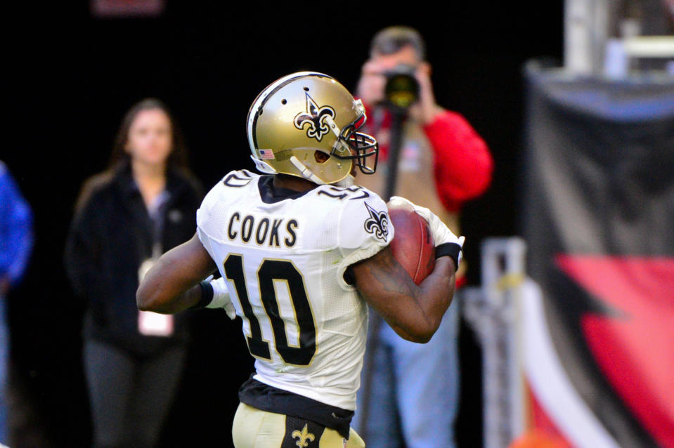 Dec 18, 2016; Glendale, AZ, USA; New Orleans Saints wide receiver Brandin Cooks (10) carries the ball after a catch for a touchdown in the first half against the Arizona Cardinals at University of Phoenix Stadium. Mandatory Credit: Matt Kartozian-USA TODAY Sports