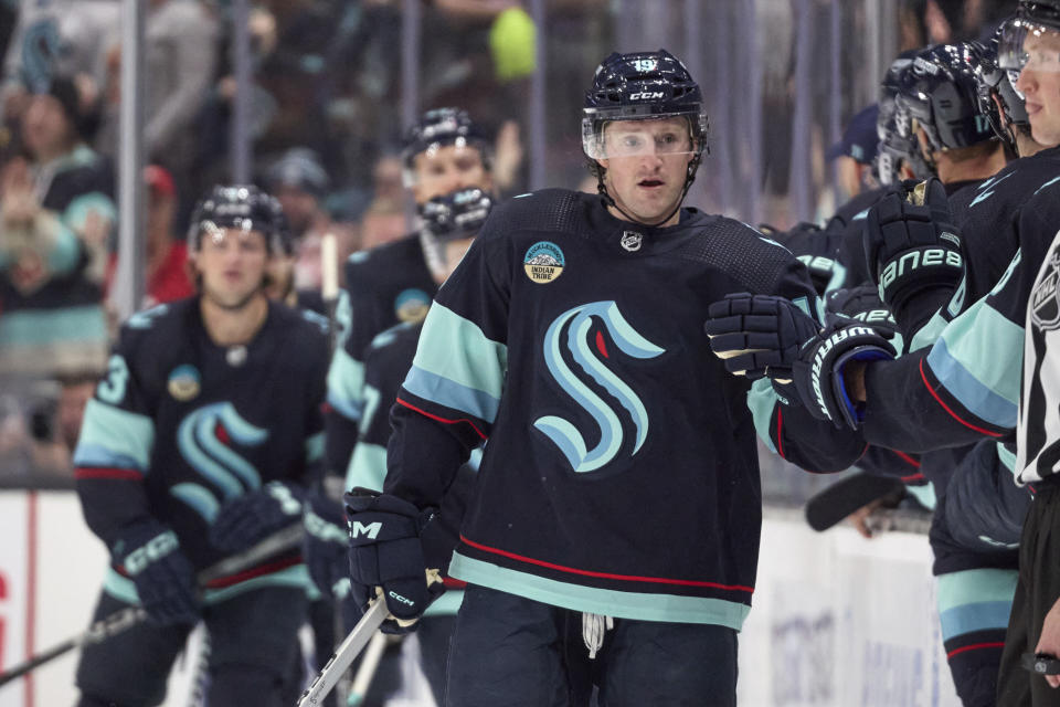 Seattle Kraken left wing Jared McCann celebrates his second goal of the game against the Detroit Red Wings during the second period of an NHL hockey game, Monday, Feb. 19, 2024, in Seattle. (AP Photo/John Froschauer)