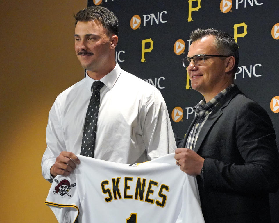 Pittsburgh Pirates first round draft pick, pitcher Paul Skenes, left, poses with Pirates general manager Ben Cherington after signing with the team in Pittsburgh, Tuesday, July 18, 2023. The Pirates drafted Skenes first player overall in this year's Major League Baseball draft. (AP Photo/Gene J. Puskar)