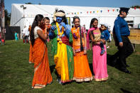 <p>People dressed as the Hindu god Lord Krishna and his consort pose for photographs with guests during the Janmashtami Festival at Bhaktivedanta Manor on September 2, 2018 in Watford, England. Around 70,000 people are expected to attend the Krishna Janmashtami Festival celebrations over two days at Bhaktivedanta Manor to mark the birth of the Hindu god Lord Krishna. The event is thought to be one of the largest Hindu festival gatherings outside of India. (Photo by Jack Taylor/Getty Images) </p>